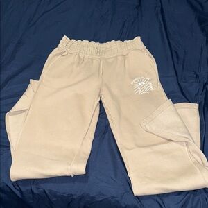 Cream Boot Cut Pants with Elastic Waistband and Textured Fabric- never worn.